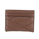 Brown leather card case with stitched chevron panels and top card slot