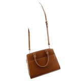 Brown leather satchel with long strap and small top handles