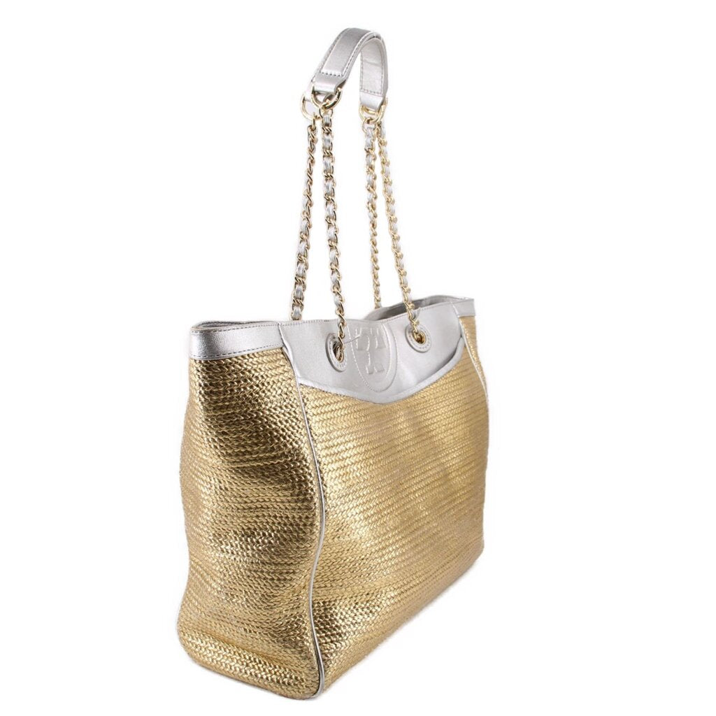 Gold and silver raffia tote bag with top handles and side profile