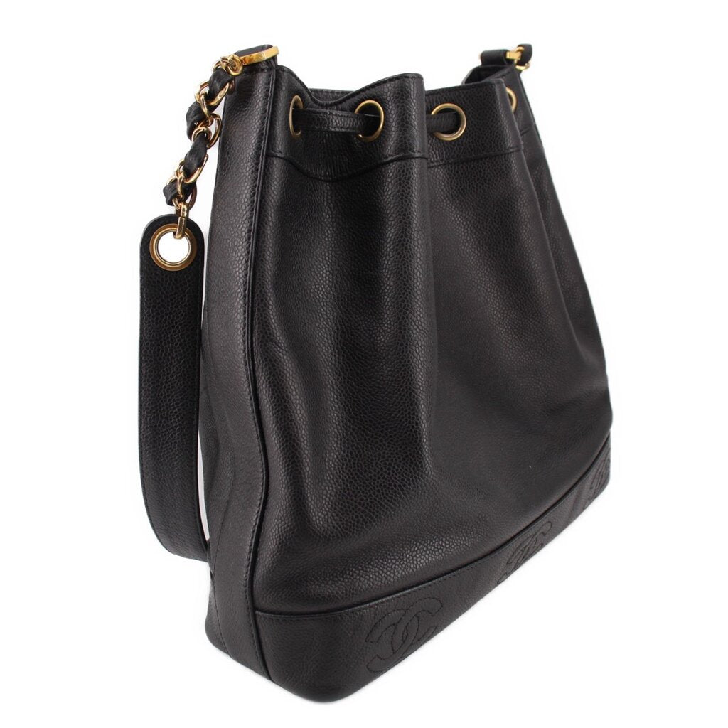 CHANEL black bucket crossbody bag with side strap and drawstring closure