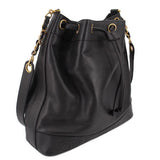 CHANEL black bucket crossbody bag with drawstring top, grommets, and shoulder strap