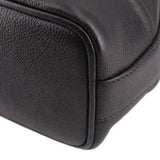 CHANEL black leather bucket crossbody bag close-up of rounded side edge and texture