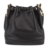 CHANEL black drawstring bucket crossbody bag with ring eyelets and gold-tone accents