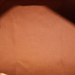 Bag interior lining in warm tan fabric