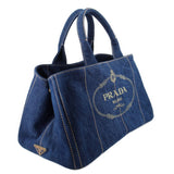 Prada Canapa denim tote bag, side view with stitched seams and logo emblem