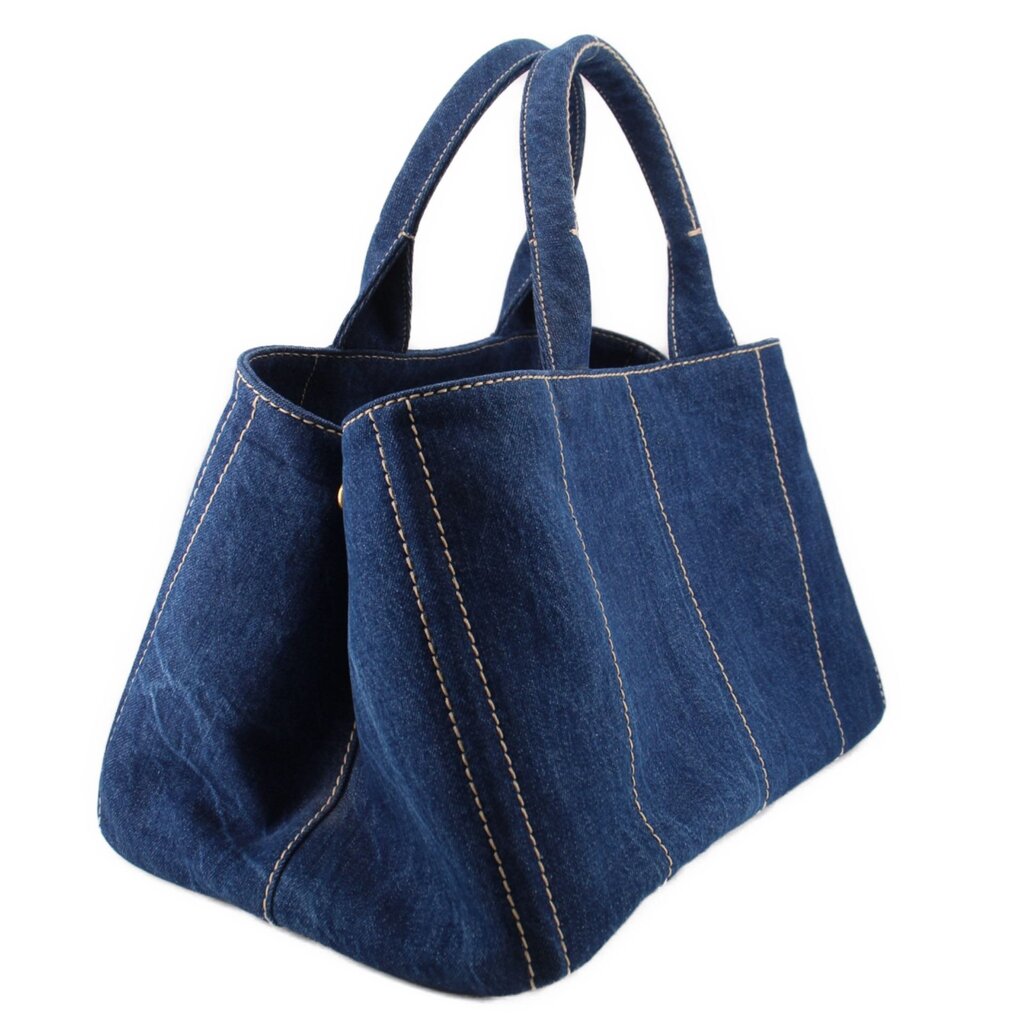 Prada Canapa denim tote bag, angled view with double handles and side panel seams