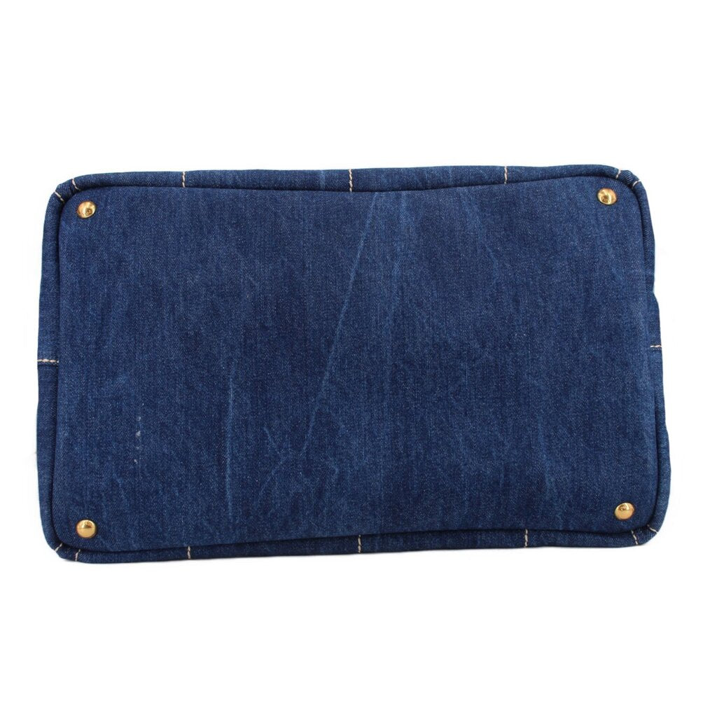 Prada Canapa denim tote bag back panel with gold snap buttons