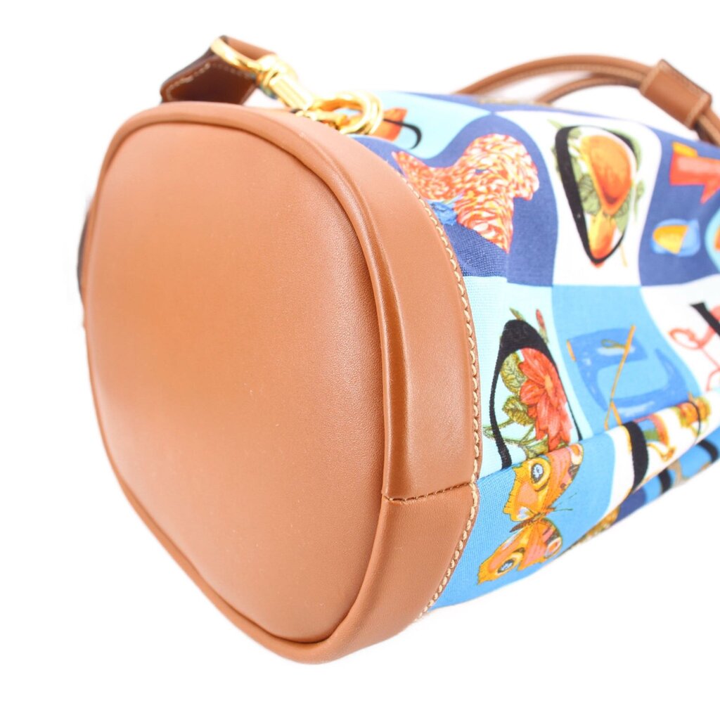 GUCCI vintage drawstring backpack, rounded tan end with blue colorful print and top hardware