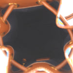 GUCCI vintage drawstring backpack, close-up of tan piping and blue printed side panel