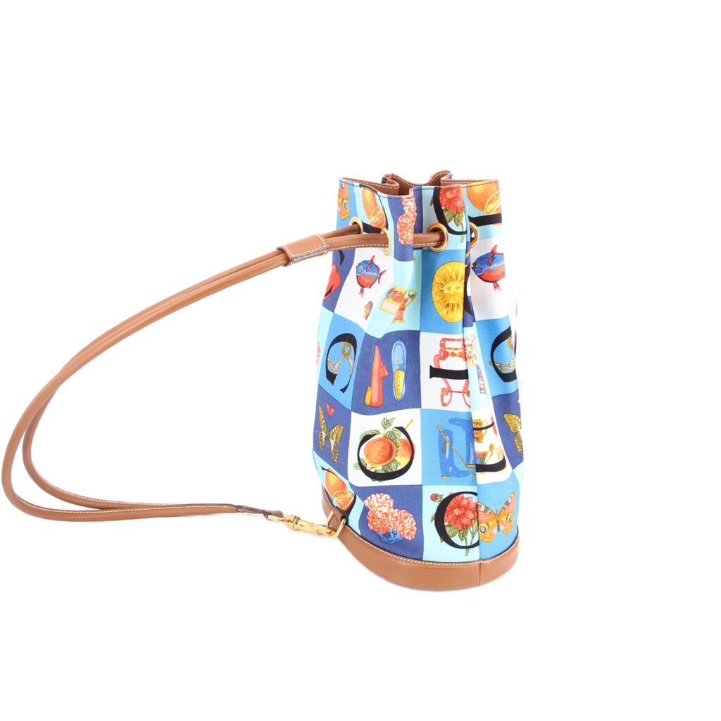 GUCCI vintage drawstring backpack, blue printed fabric with tan shoulder strap and base trim