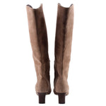 Pair of tan suede knee-high boots, back view with block heel.