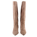Pair of tan suede knee-high boots, front view with pointed toes.
