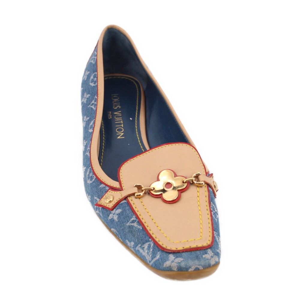 Denim monogram loafers in blue with tan trim and gold-tone clover buckle detail