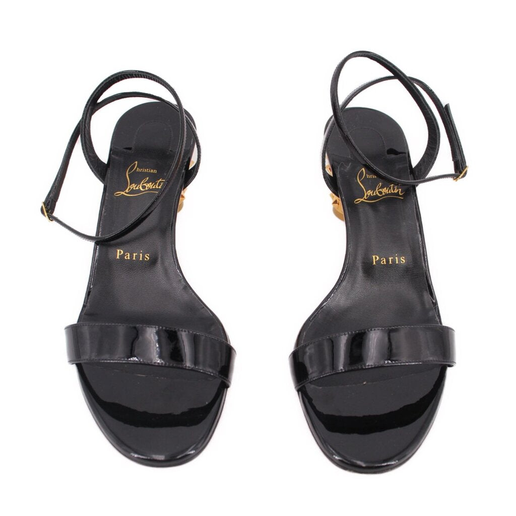 Black patent heeled sandals with wide front strap and slingback ankle strap