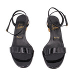 Black patent heeled sandals with wide front strap and slingback ankle strap