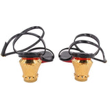 Black patent heeled sandals showing back view with ribbed gold heel