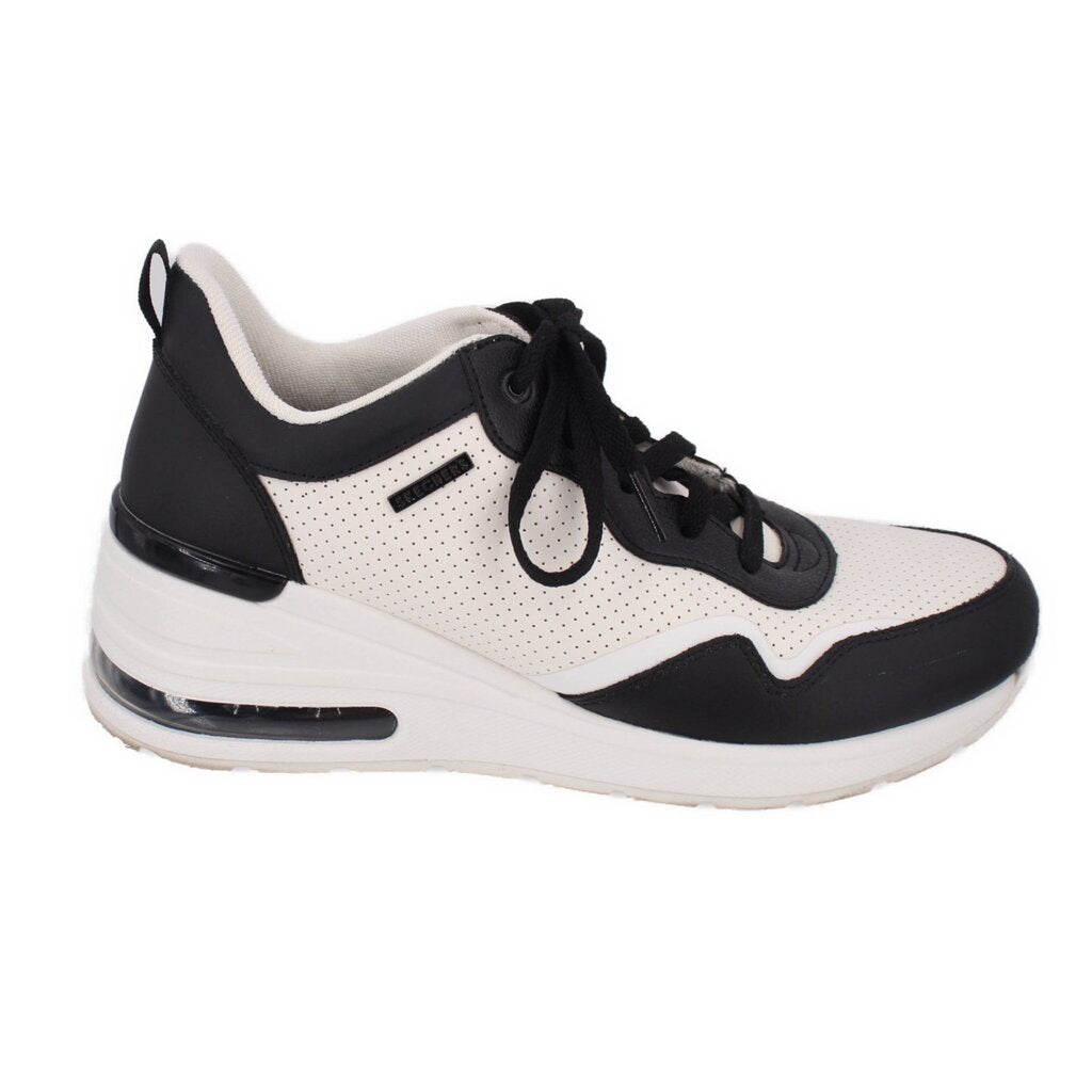Platform sneakers in black and white with lace-up front, perforated panels, white midsole