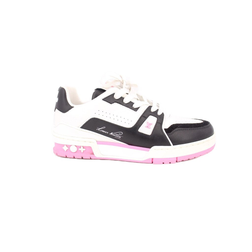 White and black low-top sneakers with pink trim, perforated panel, lace-up