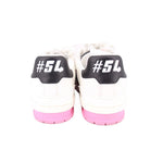 Back view of white and black sneakers with pink sole and #54 heel branding