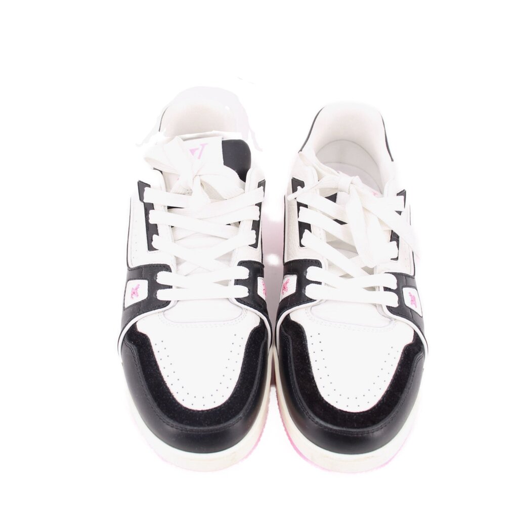 Pair of white and black lace-up sneakers with pink-tinted sole, front view