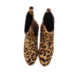 Pair of leopard calf hair pull-on boots with dark lining and rounded toe