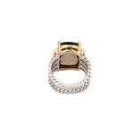Braided sterling silver ring with gold prongs holding smoky topaz, open back view
