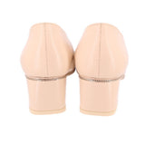 Nude back view heels with covered heel and metal-trimmed runner detail