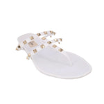 White Valentino rubber Rockstud slide sandals with gold pyramid studs on strap
