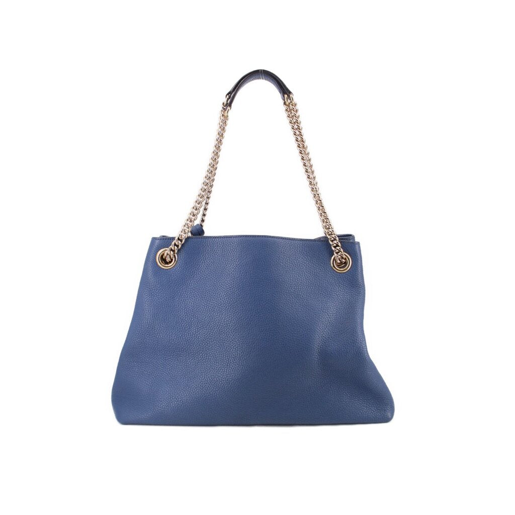 GUCCI Soho chain tote bag in blue leather with gold chain handles and minimal front branding.