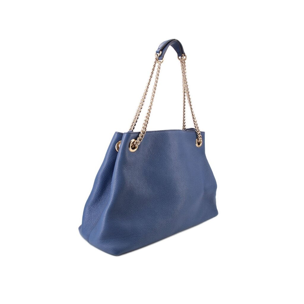 GUCCI Soho chain tote bag in blue leather with gold chain handles and tassel detail.