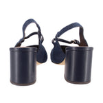 Back view of blue denim slingback heels with black leather lining and block heel
