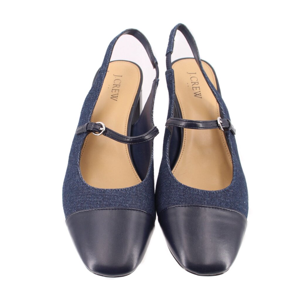 Pair of blue denim slingback heels with black leather toe and ankle strap