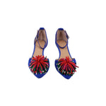 Pair of blue suede heeled sandals with multicolor pom-pom appliques