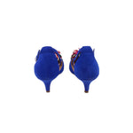 Blue suede heeled sandals from the back with multicolor pom-pom detail