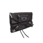 BALENCIAGA black envelope crossbody bag with front strap buckles and zipper pocket
