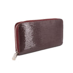 Epi zip wallet with silver zipper and textured burgundy leather, side view