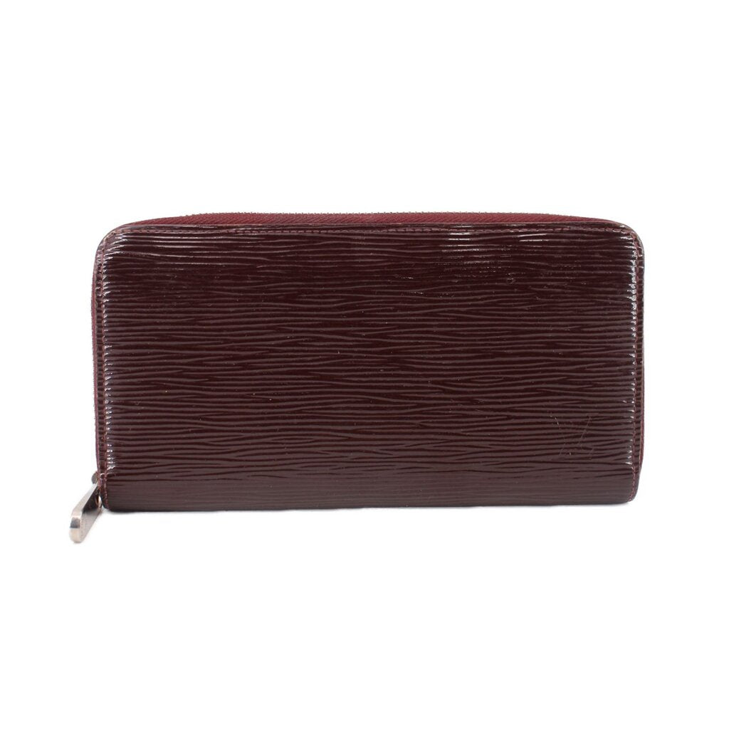 LOUIS VUITTON Epi zippy wallet in maroon, full-length side zip, textured leather