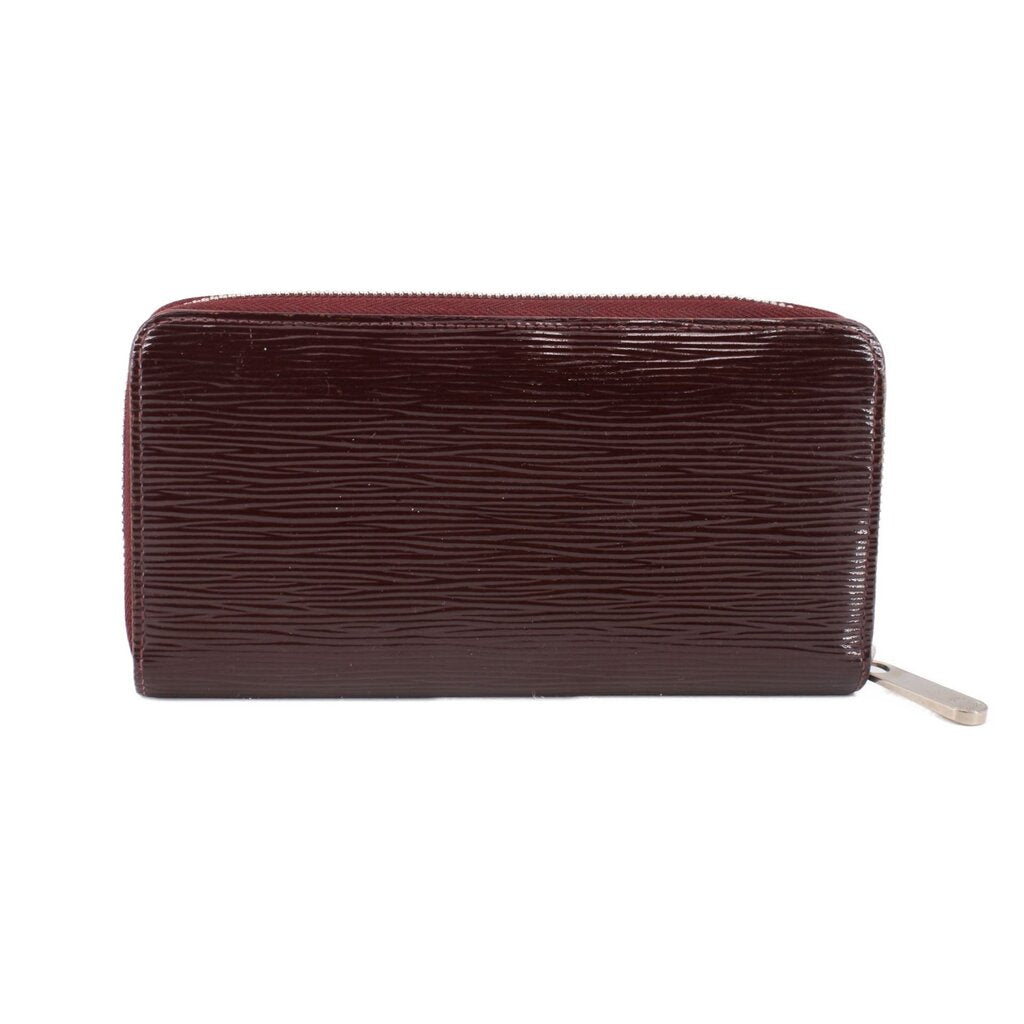 Epi zip wallet, burgundy textured leather front view with silver pull tab