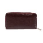 Epi zip wallet, burgundy textured leather front view with silver pull tab