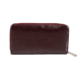 Epi zip wallet, burgundy textured leather front view with silver pull tab