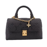 Black monogram flap crossbody bag with gold chain and lock closure