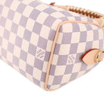 LOUIS VUITTON Damier Azur corner view with gold-tone hardware and tan zipper trim
