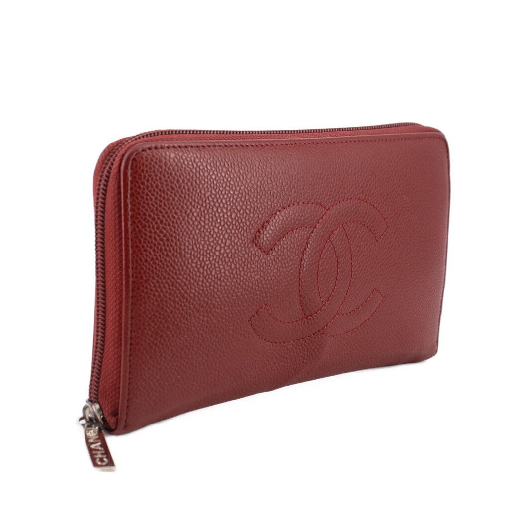 CHANEL red zip-around wallet side view with CC logo embossing