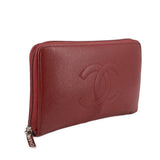 CHANEL red zip-around wallet side view with CC logo embossing