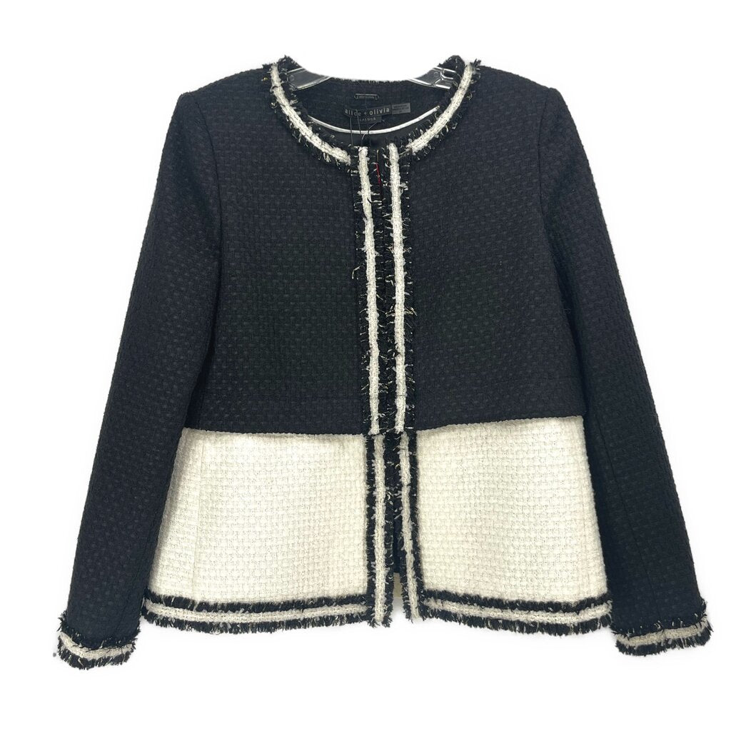 Black tweed jacket with cream stripe trim and fringe hem, front buttonless design