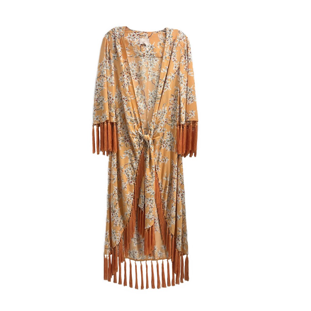Orange fringe jacket with light floral print, tassel cuffs and hem