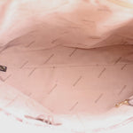 Satchel interior lining with printed branding and roomy open top