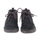 Pair of black suede booties with lace-up eyelets and cushioned collar