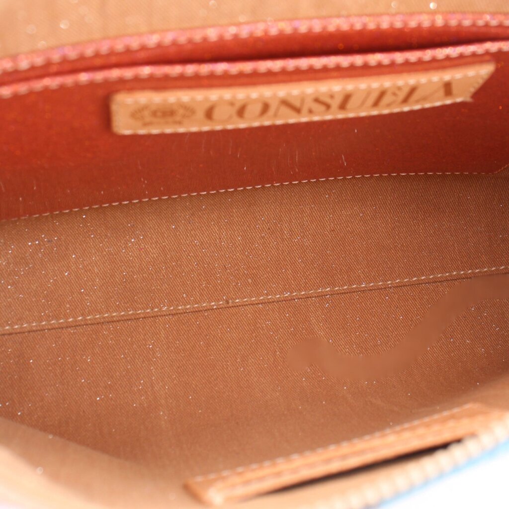 CONSUELA logo on fabric lining inside teal crossbody bag