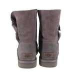 UGG gray suede boots with rear logo patch and fuzzy cuff trim
